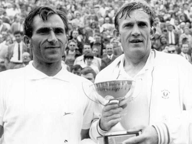 1966. Tony Roche holds the trophy after beating Istvan Gulyas in the final of the French Open in Paris. Tennis. SUPPLIED PHOTO: UPI