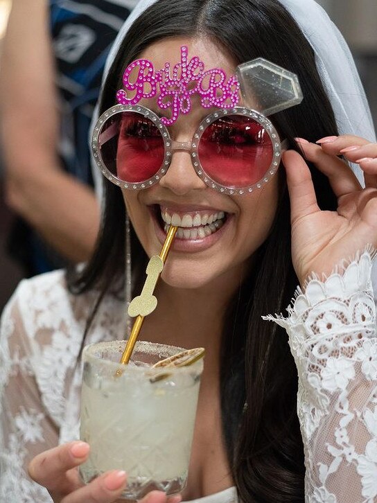 The bride-to-be sipped cocktails at the festivities.