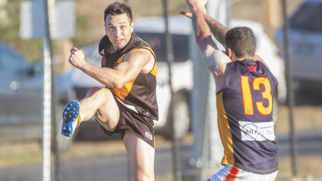 Westmeadows star Robbie Castello sends his team forward. Picture: Rob Leeson