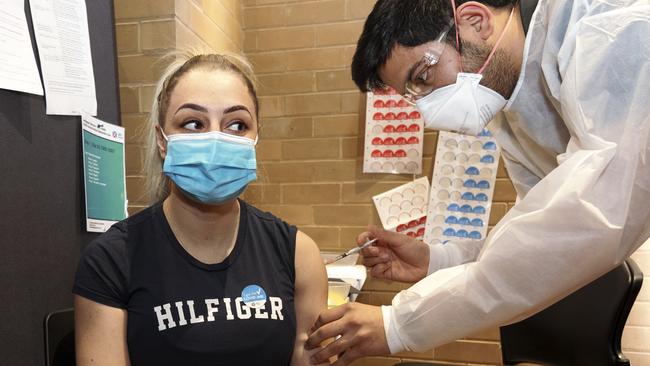 Anna McDonald receives her Covid vaccination at the Broadmeadows Town Hall. Picture: David Geraghty