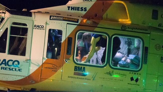 A rescue helicopter lands in Mackay after picking up a man mauled by a shark at Cid Harbour yesterday. Picture: Daryl Wright