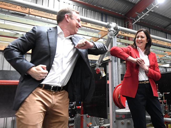 BRISBANE , AUSTRALIA - NewsWire Photos - OCTOBER 18, 2020.Queensland Premier Annastacia Palaszczuk elbow-buenos with her deputy Steven Miles during LaborÃs campaign launch in Brisbane. Queenslanders go to the polls on October 31. Picture: NCA NewsWire / Dan Peled