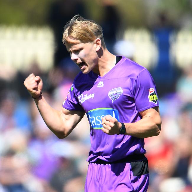 HOBART, AUSTRALIA – DECEMBER 24: Nathan Ellis of the Hurricanes celebrates the wicket of Richard Gleeson during the Big Bash League match between the Hobart Hurricanes and the Melbourne Renegades at Blundstone Arena on December 24, 2019 in Hobart, Australia. (Photo by Steve Bell/Getty Images)