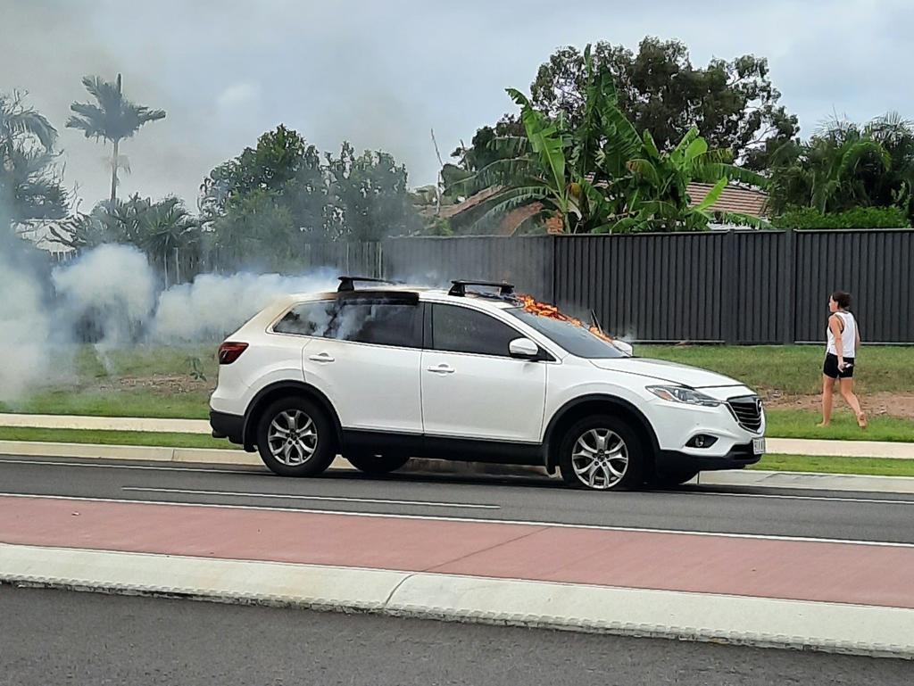 The car moments before it becomes engulfed by flames. Photo: Sheryl Perry