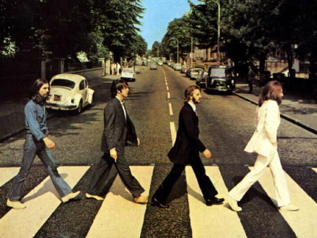 Another road ... The Beatles as seen on their Abbey Road album cover George Harrison, Paul McCartney, Ringo Starr and John Lennon.