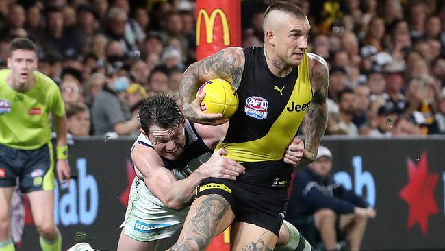 Geelong’s Patrick Dangerfield tackles Richmond great Dustin Martin in the 2020 Grand Final. Picture: Sarah Reed