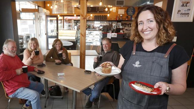 Nino’s owner Kirsten Pitman serving customers at her restaurant in Victor Harbor after restrictions were lifted allowing them to serve customers in the restaurant. Photo Kelly Barnes