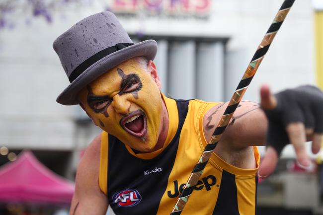 BRISBANE, AUSTRALIA - OCTOBER 24: Tigers fans pose before the 2020 AFL Grand Final match between the Richmond Tigers and the Geelong Cats at The Gabba on October 24, 2020 in Brisbane, Australia. (Photo by Chris Hyde/AFL Photos/via Getty Images)