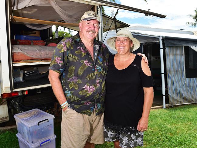 Brad Dunn and Maria Augustus-Dunn in front of their camping rig. Picture: Shae Beplate.