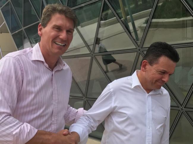 Senator Cory Bernardi unexpectedly meets Nick Xenophon outside SAHMRI during the SA Best health policy launch. Pic Brad Crouch