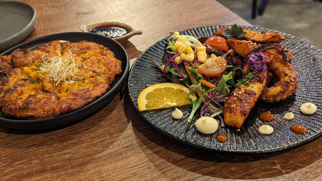 Sun &amp; Moon Eatery’s Korean kimchi pancake and Tasmanian grilled octopus. Picture: Alex Treacy