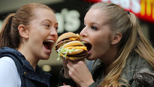 McDonalds Fat content must now be displayed on their burgers. Madison Imrei, 18, from Langwarrin, and Jayde Boothroyd, 17, from Newport. Picture: Alex Coppel.
