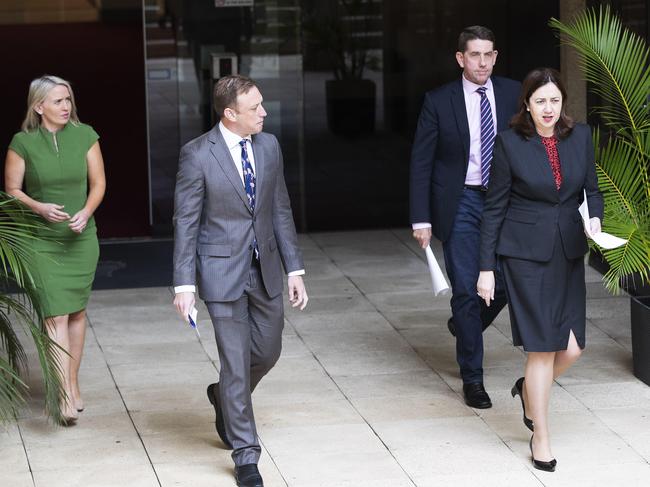 Premier Annastacia Palaszczuk with members of her reshuffled Cabinet yesterday (from left) Kate Jones, Steven Miles and Cameron Dick. Picture: Attila Csaszar