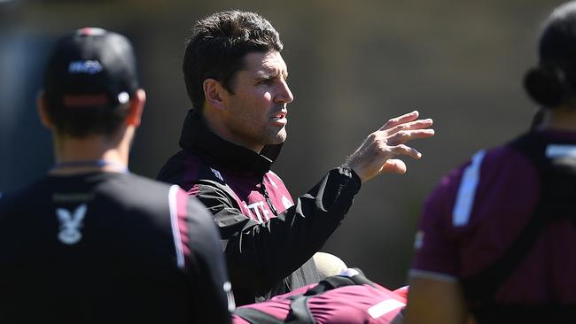 Manly coach Trent Barrett gestures during a team training session.