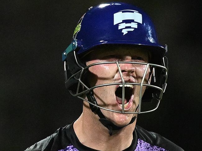 HOBART, AUSTRALIA - JANUARY 27: Mitch Owen of the Hurricanes celebrates scoring a century during the BBL The Final match between Hobart Hurricanes and Sydney Thunder at Ninja Stadium on January 27, 2025 in Hobart, Australia. (Photo by Steve Bell/Getty Images)