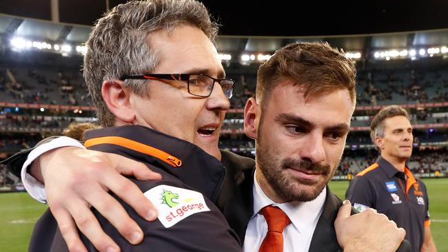 Giants coach Leon Cameron celebrates the win with injured star Stephen Coniglio. Picture: Getty Images