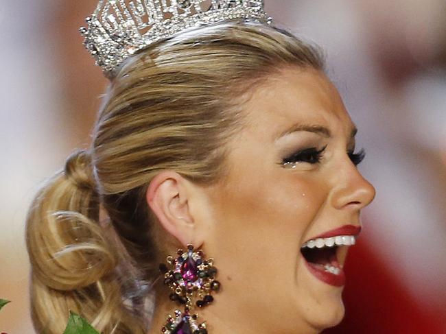 Miss New York Mallory Hagan waves after she was crowned Miss America 2013 on Saturday, Jan. 12, 2013, in Las Vegas. (AP Photo/Isaac Brekken)