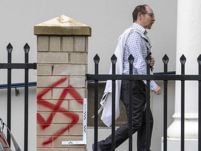 SYDNEY, AUSTRALIA - NewsWire Photos - JANUARY 11, 2025: Anti semitic attack on the Newtown Synagogue, Sydney. Crime scene has been established. A member outside the entrance before the service begins. Picture: NewsWire / Simon Bullard.