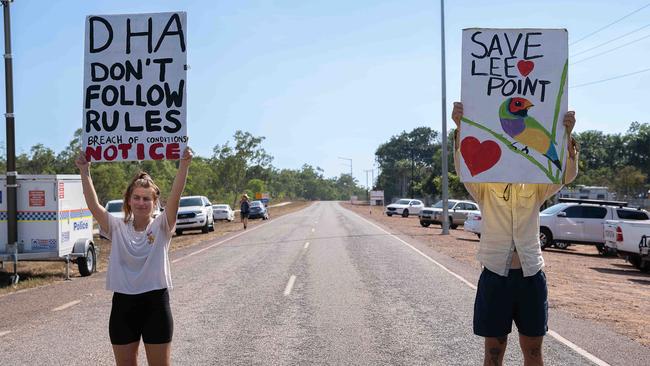 Protesters at the site of Defence Housing Australia’s Lee Point development as bulldozers moved in last week. Picture: Pema Tamang Pakhrin