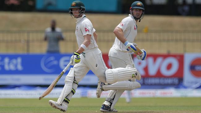Australia's Shaun Marsh, right, and Steve Smith run between wickets during the third day of their third test cricket match against Sri Lanka in Colombo this month.