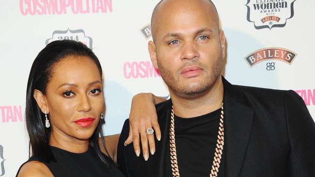 LONDON, ENGLAND - DECEMBER 03: Melanie Brown and Stephen Belafonte attend the Cosmopolitan Ultimate Women of the Year Awards at One Mayfair on December 3, 2014 in London, England. (Photo by Stuart C. Wilson/Getty Images)