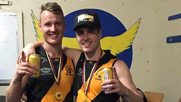 Ben Gogel (left) celebrating one of his premierships with Mypolonga. Picture: Supplied