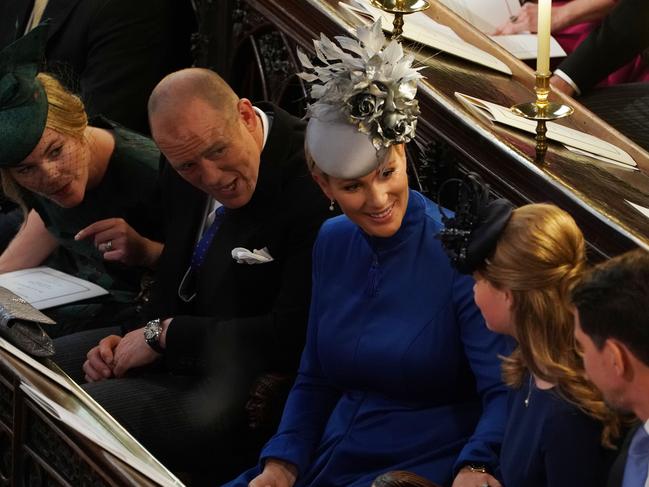 Autumn Phillips, Mike Tindall, Zara Tindall and Lady Louise Mountbatten-Windsor attend the wedding of Princess Eugenie of York and Mr. Jack Brooksbank at St. George’s Chapel on October 12, 2018 in Windsor, England. (Photo by Owen Humphreys - WPA Pool/Getty Images)