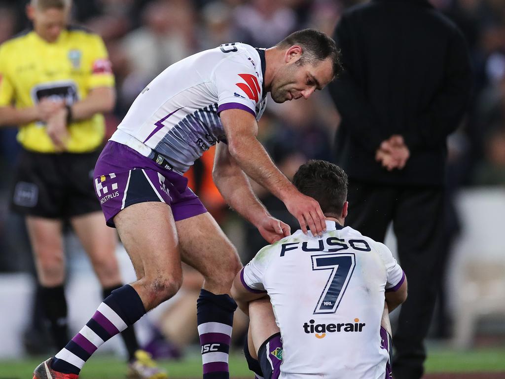 Melbourne's Cameron Smith consoles Brodie Croft during the 2018 NRL Grand Final between the Sydney Roosters and Melbourne Storm at ANZ Stadium. Picture. Phil Hillyard