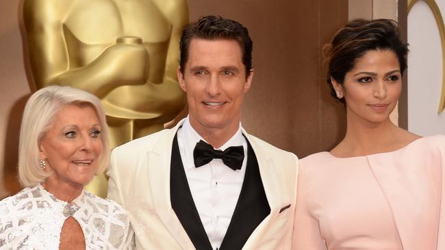 Matthew McConaughey with his mother, Mary Kathlene, and wife Camila Alves at the 2014 Oscars. Picture: Jason Merritt/Getty Images