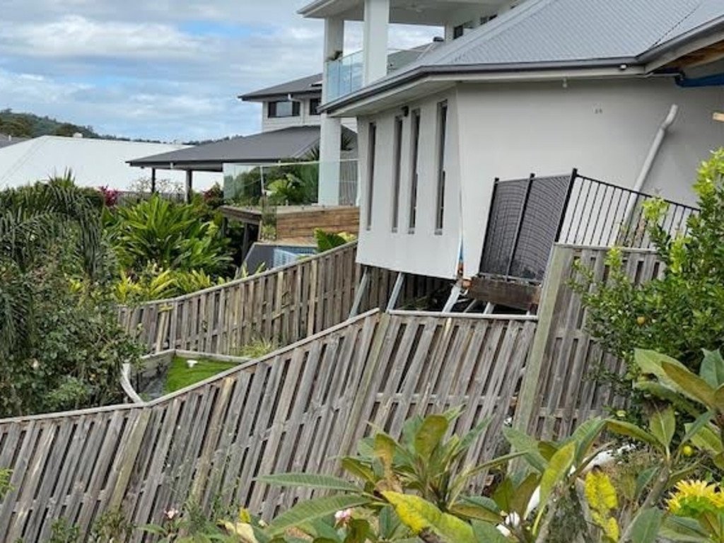 Riverstone Crossing on the Gold Coast - backyard fences falling apart after a landslip.