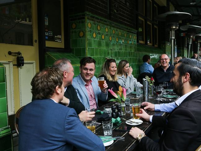 SYDNEY, AUSTRALIA - NewsWire Photos, OCTOBER 11 2021: Excited patrons enjoy their first beer back at the Mercantile Pub in the Rocks as Pubs reopen in Sydney on "Freedom Day". in Sydney. Picture:  NCA NewsWire / Gaye Gerard