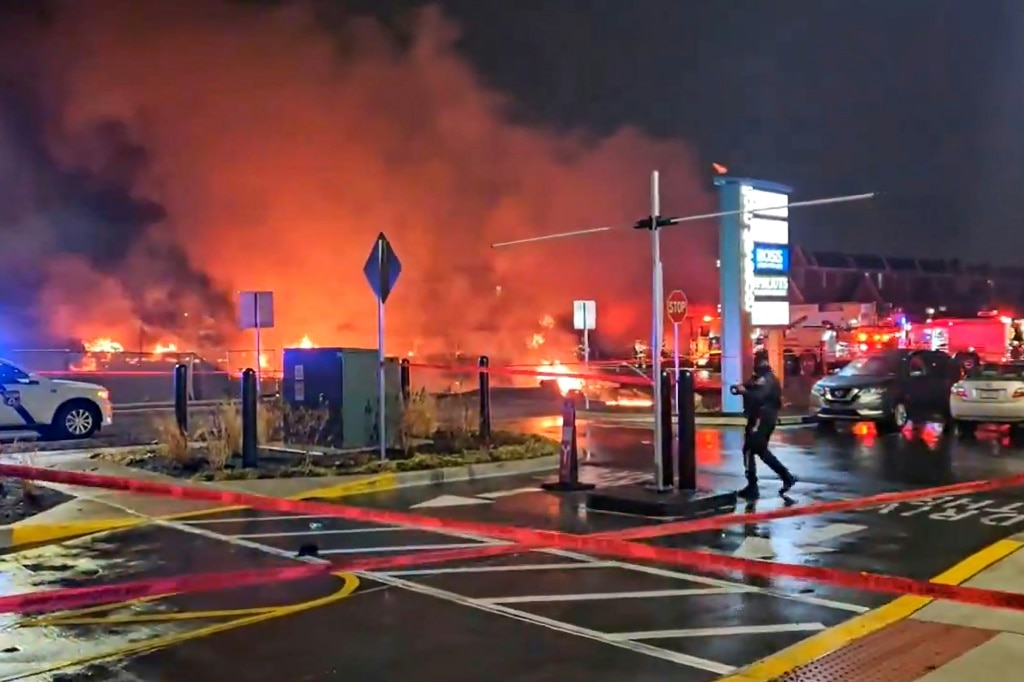 Fires and plumes of smoke in northeast Philadelphia after a small aircraft crashed on January 31, 2025 near a strip mall