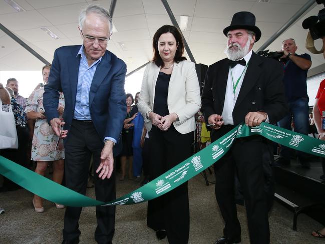 Then mayor Allan Sutherland in period dress as then prime minister Malcolm Turnbull and Premier Annastacia Palaszczuk open the Moreton Bay rail line.