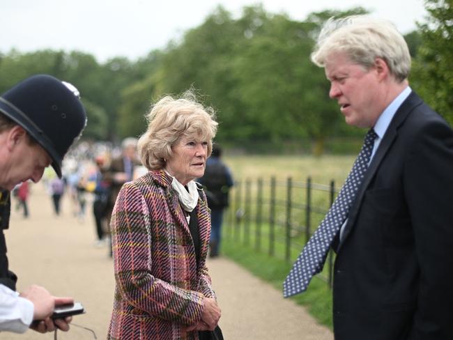 Sarah McCorquodale, centre, and Charles Spencer, right, siblings of Princess Diana arrive at Kensington Palace for the event. Picture: AFP