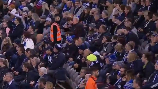 Security and "Behavioural Awareness Officers" patrol the crowd at the Carlton-Bulldogs clash at Marvel Stadium Picture: Channel 7