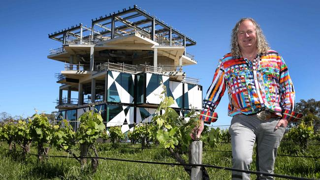 Chester Osborn stands next to the d'Arenberg Winery's new building, in the shape of a Rubiks cube, during its construction in October.