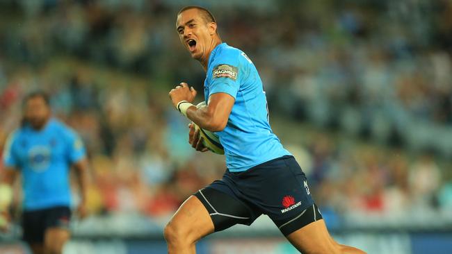 Peter Betham scores for the Waratahs during the Waratahs v Queensland Reds Super Rugby game at ANZ Stadium, Sydney. pic mark evans