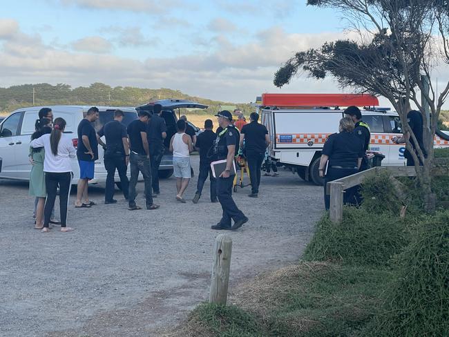 Onlookers at the scene of the Phillip Island drowning. Picture: Jack Colantuono