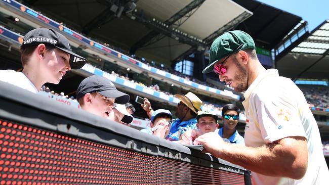 Mitch Marsh signs autographs for fans - presumably ones who didn’t boo him. Picture: Getty