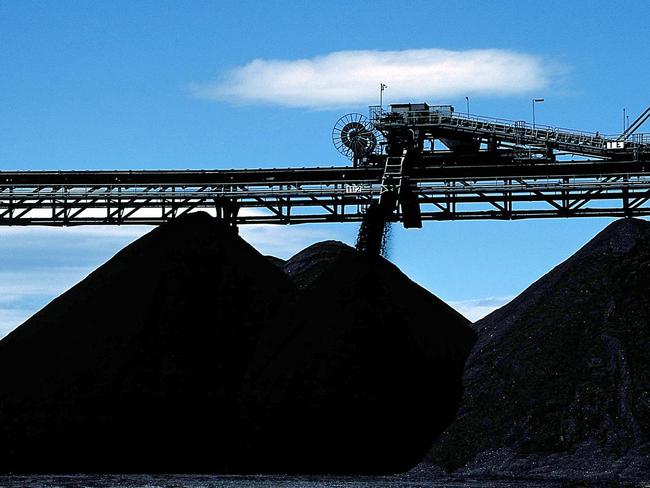 An undated handout photograph from Anglo American Plc shows coal being stockpiled at the Moura coal mine in Australia, released to the media on Monday, June 22, 2009.  Xstrata Plc, the Swiss metals company that sold shares in London seven years ago, is seeking a merger with Anglo American Plc  to create a mining group that would rival BHP Billiton Ltd., the world's largest. Source: VisMedia via Bloomberg News EDITOR'S NOTE: NO SALES. EDITORIAL USE ONLY.