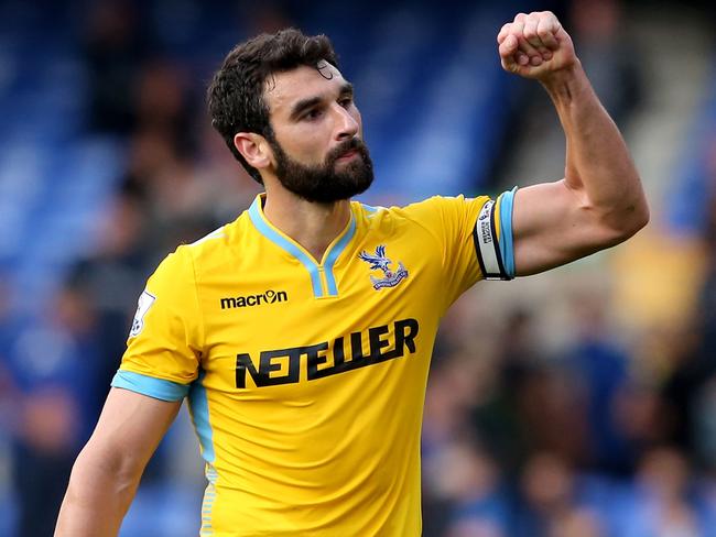 LIVERPOOL, ENGLAND - SEPTEMBER 21: Mile Jedinak (R) of Crystal Palace and his teammates applaud the travelling fans following their team's 3-2 victory during the Barclays Premier League match between Everton and Crystal Palace at Goodison Park on September 21, 2014 in Liverpool, England. (Photo by Jan Kruger/Getty Images)