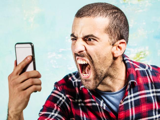 Angry man, shouting at someone in his smartphone. Social rage Istock Paris 2016.