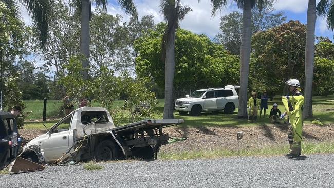 Firefighters on the scene at the crash on Midge Point Rd, Bloomsbury. Photo: Estelle Sanchez