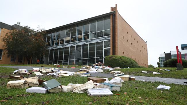 Law library books on the lawn at UTAS. Picture: SAM ROSEWARNE