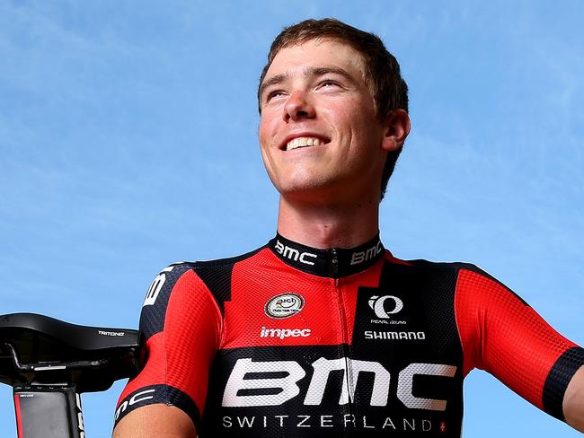 CYCLING - Rohan Dennis with his girlfriend Melissa Hoskins, who rides for GreenEDGE and his new BMC bike and jersey. Photo Sarah Reed