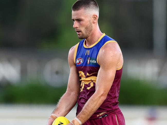 BRISBANE, AUSTRALIA - FEBRUARY 22: Josh Dunkley of the Lions kicks during an AFL practice match between Brisbane Lions and Gold Coast Suns at Brighton Homes Arena on February 22, 2024 in Brisbane, Australia. (Photo by Chris Hyde/Getty Images)