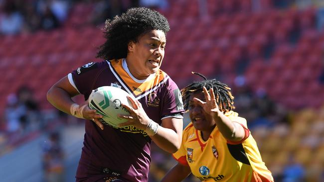 Teuila Fotu-Moala of the Broncos before scoring a try during the Women's Rugby League trial match between the Brisbane Broncos and the PNG Orchids at Suncorp Stadium in Brisbane, Sunday, September 2, 2018. (AAP Image/Dave Hunt) NO ARCHIVING, EDITORIAL USE ONLY