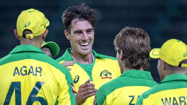 Australia's bowler Pat Cummins, middle, celebrates with teammates after dismissing South Africa's batsman David Miller during the 1st T20 cricket match between South Africa and Australia at Wanderers stadium in Johannesburg, South Africa, Friday, Feb. 21, 2020. (AP Photo/Themba Hadebe)