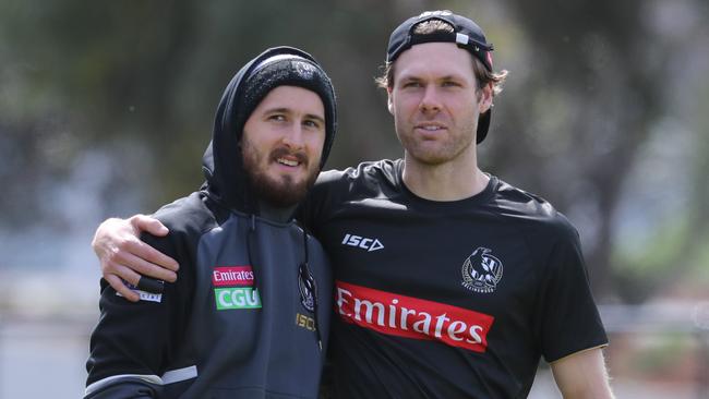 Matt Scharenberg (right) is weighing up his future at Collingwood, while Tom Phillips could be a trade option.