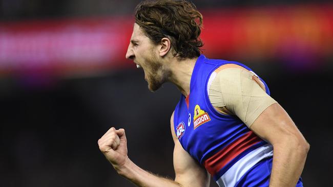 Marcus Bontempelli of the Bulldogs reacts after kicking a goal during the Round 7 AFL match between the Western Bulldogs and the Richmond Tigers at Marvel Stadium in Melbourne, Saturday, May 4, 2019. (AAP Image/Julian Smith) NO ARCHIVING, EDITORIAL USE ONLY